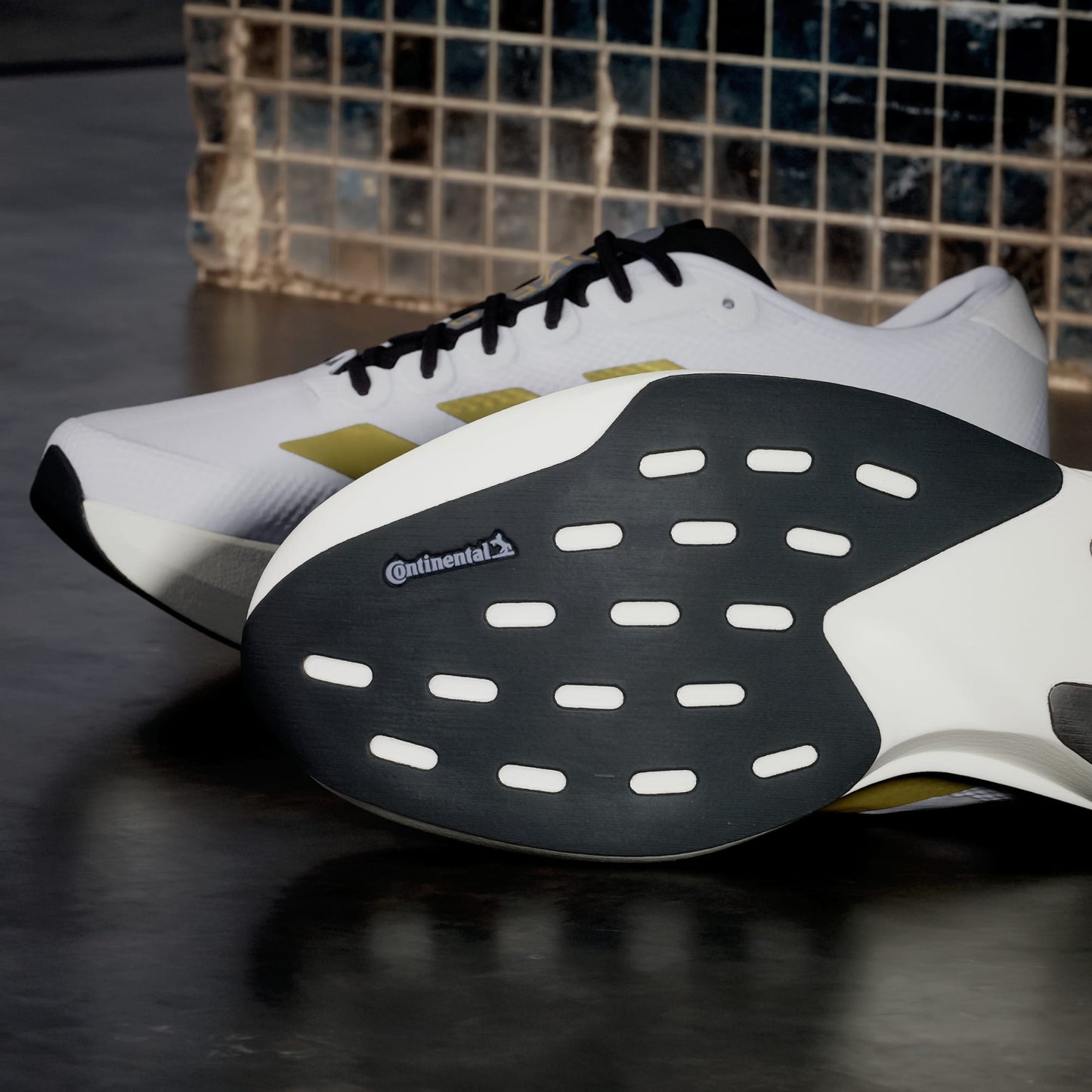 Adizero EVO SL Cloud White / Matte Gold / Core Black