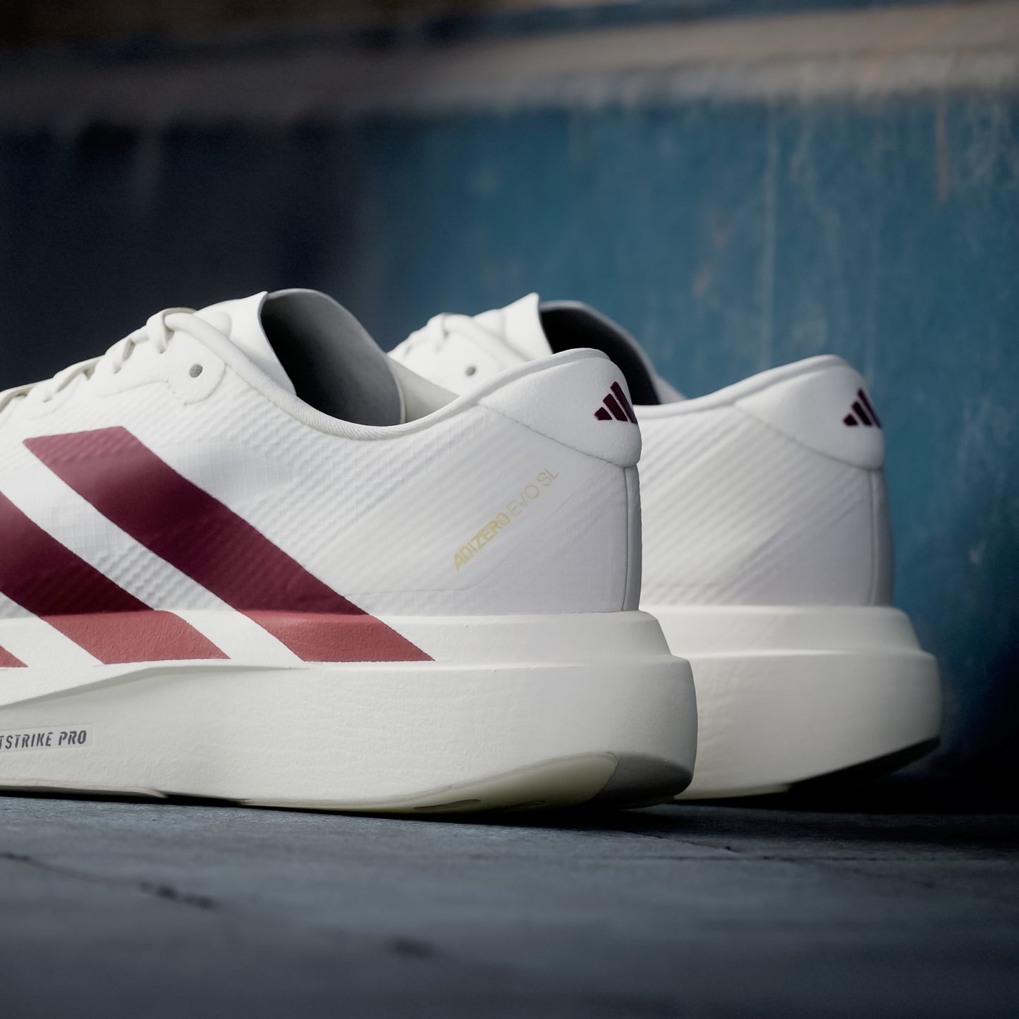 Adizero EVO SL Off White / Maroon / Mystery Red