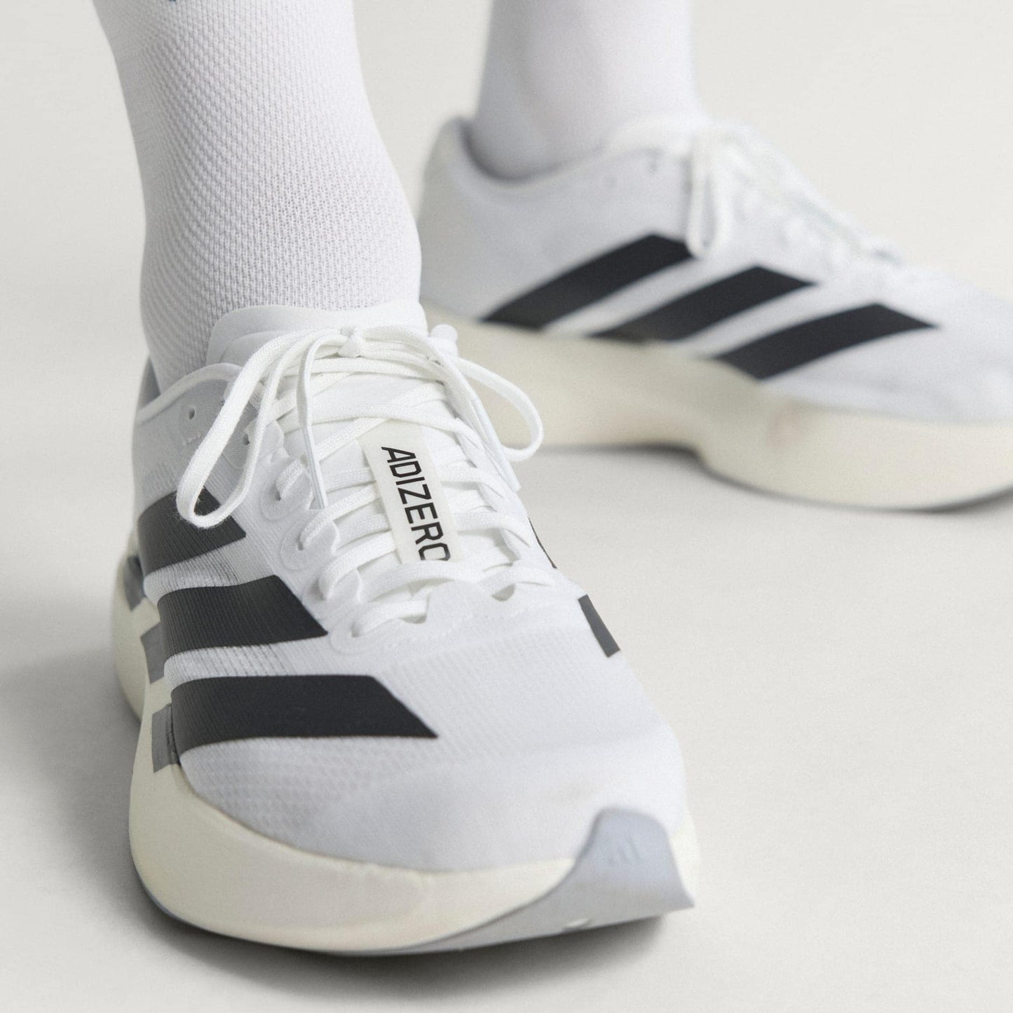 Adizero EVO SL Cloud White / Core Black / Cloud White
