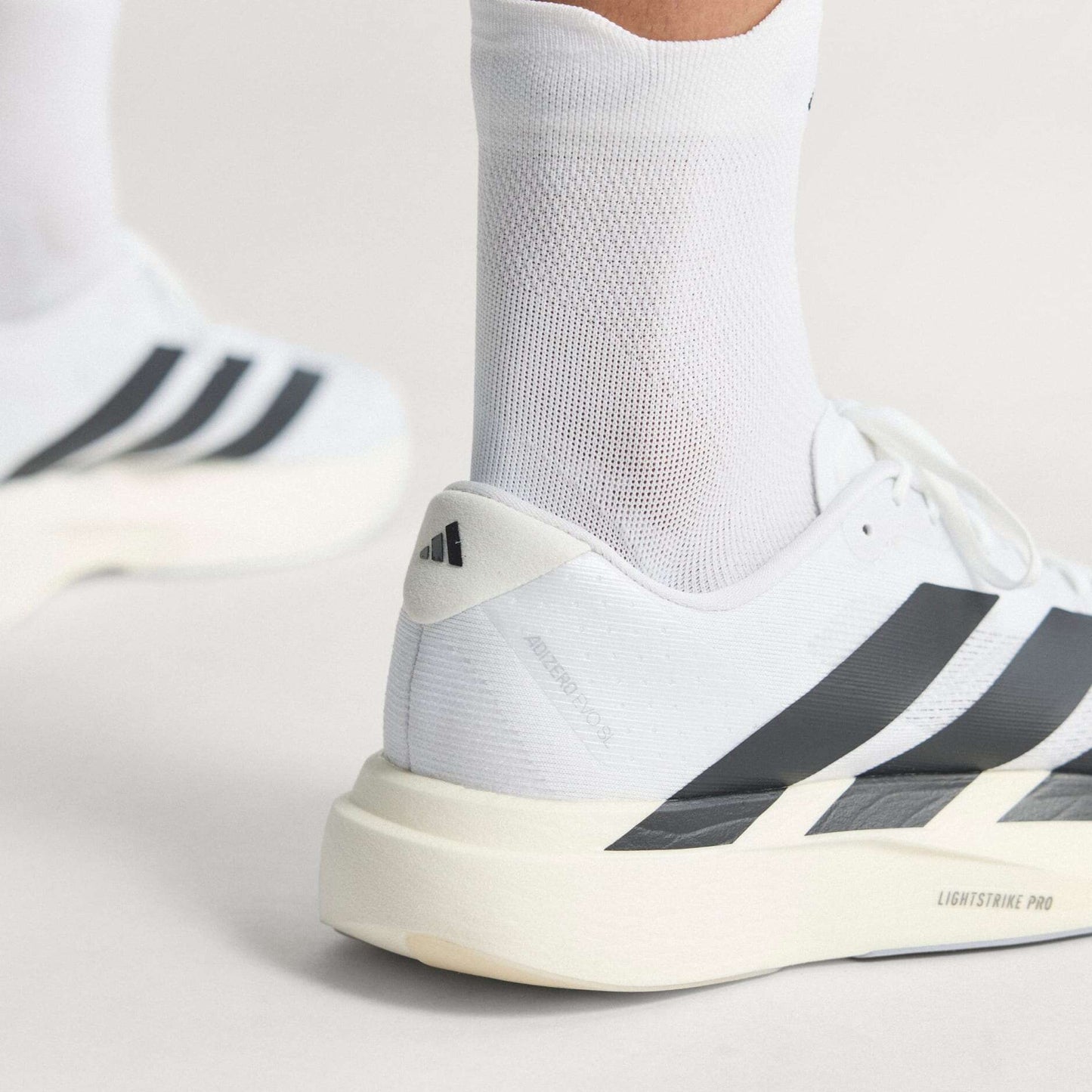 Adizero EVO SL Cloud White / Core Black / Cloud White